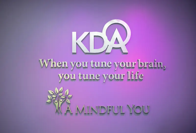 KDA logo on the lobby wall with the words: When you tune your brain, you tune your life